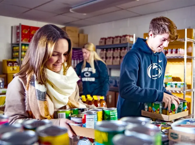 Penn State Brandywine students volunteer at a food pantry.